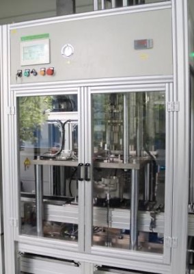 Helium leak test station