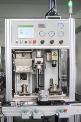 Automatic bearing press station